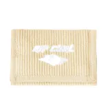 Billetera plegable color beige, confeccionada en tejido de pana acanalada. Presenta el logo de Rip Curl bordado en blanco en el centro.