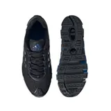 Zapatillas Adidas MEGARIDE negras con detalles en gris y azul. Presentan las tres tiras características de la marca en los laterales y una suela con tecnología de amortiguación.