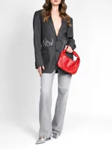 Blazer gris oscuro de lana con dos botones, bolsillos con solapa y aplique de strass con la inscripción "New York".