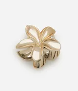 Pinza de pelo dorada con forma de flor de jazmín y acabado metalizado.