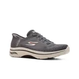 Championes grises Skechers Hands Free Slip-ins Go Walk Arch Fit 2.0 Grand Select 2, con capellada de malla jaspeada, cordones elásticos, plantilla Arch Fit removible y entresuela con amortiguación.