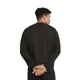 Buzo negro de cuello redondo, marca Puma, con logo pequeño estampado en blanco en el pecho.