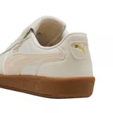 Championes Puma Palermo Premium, color negro con detalles en blanco y suela marrón.