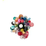 Broche circular con cuentas de diferentes colores y tamaños.