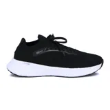 Championes deportivos Actvitta color amarillo flúor, acordonados, con suela blanca y detalles en negro.