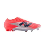 Championes de fútbol New Balance Furon Elite V8, color coral con detalles plateados y logo azul marino.