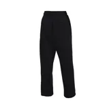 Pantalón de jogging negro con cintura elástica ajustable con cordón, corte holgado y logo Nike bordado en color naranja en la pierna izquierda.