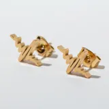 Par de aros dorados con forma de electrocardiograma.