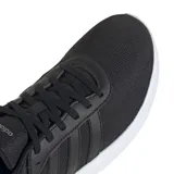 Championes Adidas Lite Racer 4.0, color negro con las tres tiras laterales y suela blanca.