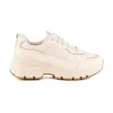 Championes Korium Vera color blanco con detalles acolchados y suela marrón.