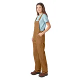 Enterito Dickies color marrón, de corte relajado, con tirantes ajustables y múltiples bolsillos.