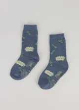 Medias de media caña color azul con estampado de comics en verde y blanco. Tejido super grueso con felpa.