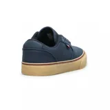 Championes Etnies Blitz de lona azul marino con logo de la marca en el lateral y suela de goma color caramelo.