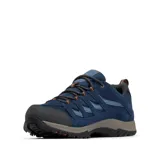 Zapatilla de trekking Columbia modelo Crestwood Waterproof, color azul marino con detalles en azul claro y cordones con toques naranjas. Presenta una construcción impermeable con tecnología Omni-Tech, entresuela TechLite para amortiguación y suela Omni-Grip para tracción todo terreno.