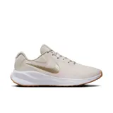 Championes de running Nike Revolution 7, color beige con logo dorado.