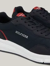 Zapatillas Tommy Hilfiger de hombre color azul marino con detalles en rojo y blanco.