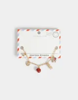 Pulsera dorada de cadena con dijes colgantes: manzana roja, herradura, cuentas doradas y dije ovalado.
