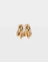 Par de aros tipo argolla dorados con múltiples aros entrelazados.