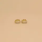 Aros dorados con forma de corona de laurel, con incrustaciones de circonias.