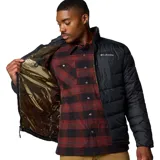 Campera puffer negra marca Columbia, modelo Labyrinth Loop II, para hombre. Confeccionada con forro térmico Omni-Heat™ Infinity, tela resistente al agua Omni-Shield™ y aislamiento Thermarator™ de poliéster reciclado. Cuenta con bolsillos con cremallera en el pecho y las manos, dobladillo ajustable con cordón y puños elásticos.