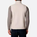 Chaleco de polar Columbia Fast Trek para hombre, color azul marino con cierre y detalles en azul eléctrico. Cuenta con cuello alto, bolsillos laterales con cierre y bolsillo en el pecho con cierre.