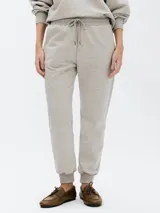 Pantalón babucha de algodón color gris claro, con cintura elástica ajustable con cordón.