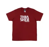 Remera color bordó con el logo de Thrasher impreso en contraste blanco, de corte clásico.