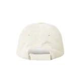 Gorra de béisbol color crema de pana con logo de Rip Curl bordado en negro.