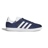 Championes Adidas Gazelle de gamuza azul marino con las tres tiras laterales blancas y detalles dorados.