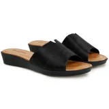 Sandalias Usaflex negras con capellada de cuero y suela comfy.