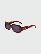 Lentes de sol Longchamp con montura rectangular de carey y lentes grises.