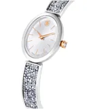 Reloj de pulsera con caja ovalada de acero inoxidable y detalles en tono oro rosa. El brazalete es de metal ajustable decorado con piedras de cristal Ultra Fine Crystal Rocks. La esfera es iridiscente blanca con el cisne de Swarovski a las 12 horas.