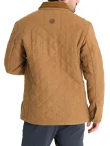 Chaqueta acolchada gris con patrón de rombos, cuello de pana marrón, cierre con broches metálicos, bolsillos frontales y bolsillo interno.