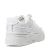 Zapatillas deportivas blancas con plataforma y cordones. Diseño minimalista y suela track.