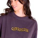 Remera de mujer color crema, corte boxy y mangas cortas. Presenta logo de Caterpillar bordado en el pecho.