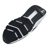 Championes Under Armour Charged Commit TR 4, color gris claro con logo negro y suela blanca.