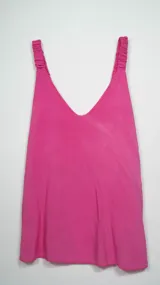 Top sin mangas de color lila, con breteles elásticos y corte holgado.