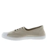 Zapatillas de lona color beige sin cordones, con puntera de goma blanca y suela de caucho vulcanizado.