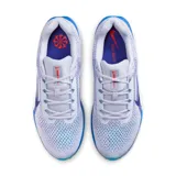 Championes de running Nike Winflo 11, color lila con detalles en azul y blanco.