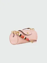Bandolera Longchamp modelo Le Pliage Xtra, tamaño S, color terracota, con correa de cuero ajustable y cierre con botón a presión.