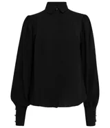 Camisa verde esmeralda de poliéster con cuello camisero, mangas largas abullonadas con puños anchos abotonados y cierre frontal abotonado.