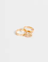 Set de dos anillos dorados con dije de corazón imantado para compartir.