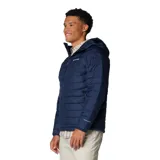 Campera puffer negra con capucha, cierre frontal completo, bolsillos laterales con cierre y logo de Columbia bordado en blanco en el pecho.