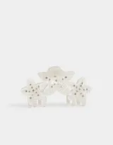 Broche para el pelo acrílico con forma de tres flores blancas con apliques de strass.
