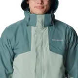 Campera 3 en 1 Columbia Bugaboo II Fleece, color verde y gris, con capa exterior impermeable y transpirable, y forro polar térmico reflectante. Incluye capucha ajustable y logo de la marca en el pecho.