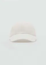 Gorra de béisbol blanca de algodón con cierre ajustable en la parte posterior.