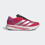 Championes de running Adidas Adizero SL 2, color fucsia/rosa intenso con detalles en plateado metálico, morado y negro. Presentan una entresuela gruesa blanca con tecnología Lightstrike Pro y detalles en rosa y morado.