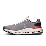 Championes urbanos On Running Cloudnova Form 2, color gris con detalles en blanco y rojo.