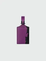 Porta dirección para valijas de Longchamp, con diseño en color naranja y negro.