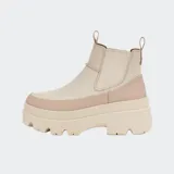 Botas Chelsea color beige con plataforma y suela track.